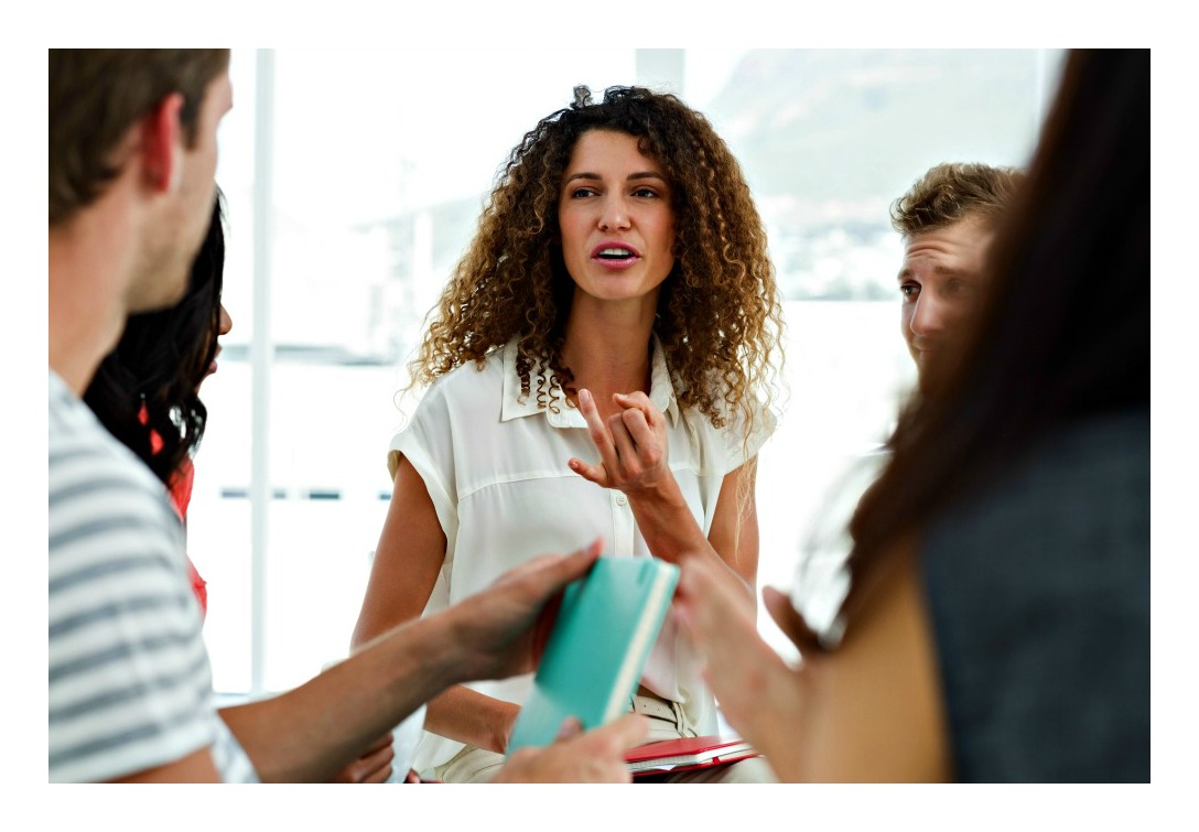 A group of people in group counseling.